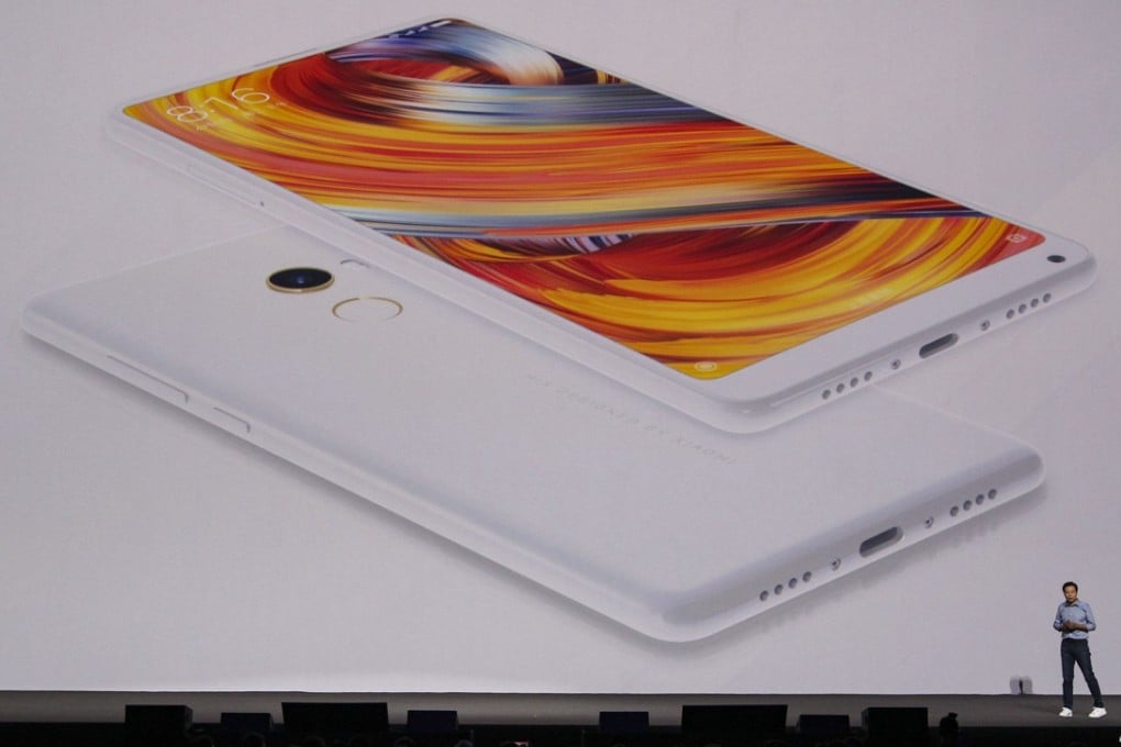 Lei Jun, CEO and founder of Xiaomi, introduces the new ceramic Mix 2 smartphone, in Beijing on Sep. 11, 2017. SCMP/Simon Song