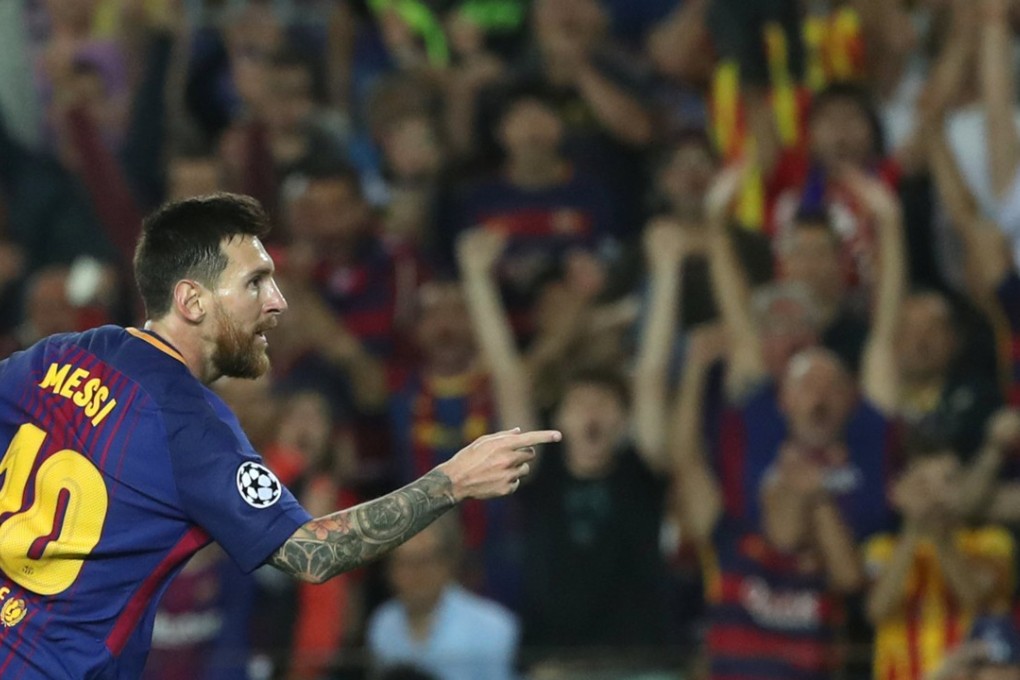 Lionel Messi celebrates scoring their third goal. Photo: Reuters