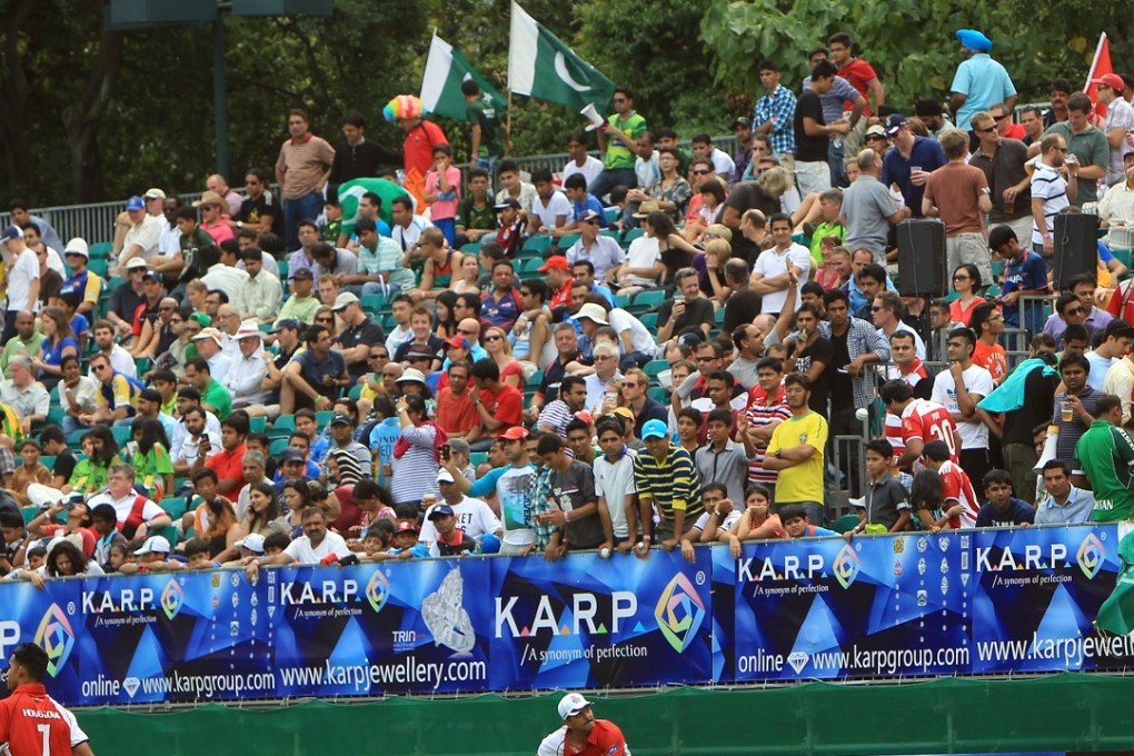 Fans enjoy the action from the 2012 Hong Kong Sixes. Photo: Jonathan Wong