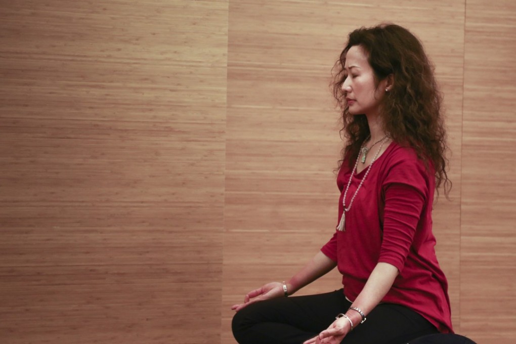 Meditation, as seen here at Pure Yoga in Hong Kong, is one of the answers to finding resilience. Photo: James Wendlinger