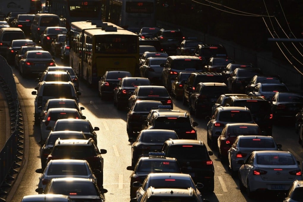 A file picture of heavy traffic in Beijing. China’s government is looking at phasing out the use of vehicles using conventional fossil fuels. Photo: AFP