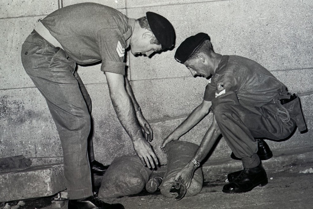 Ballistics experts detonate a bomb in Wan Chai, in 1967. Pictures: SCMP