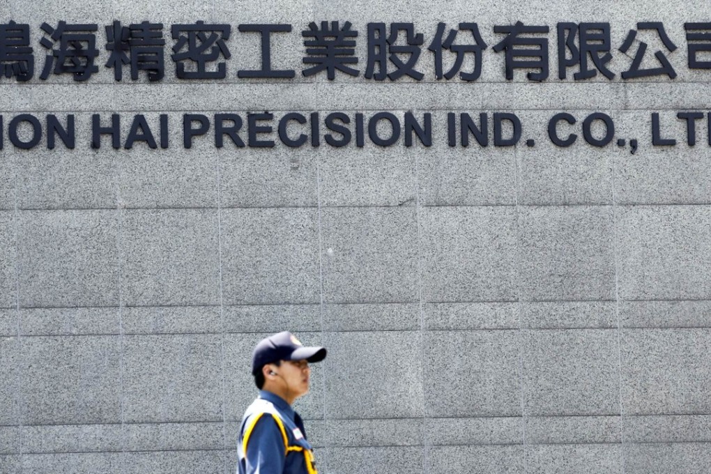 A security guard patrols at Hon Hai headquarters in Tucheng in Taipei county. Photo: Reuters