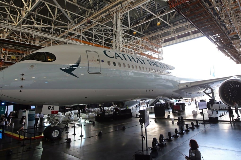 Cathay Pacific is cutting costs and restructuring in a bid to return to profit after producing the worst half-year results in almost 20 years. Photo: Edward Wong