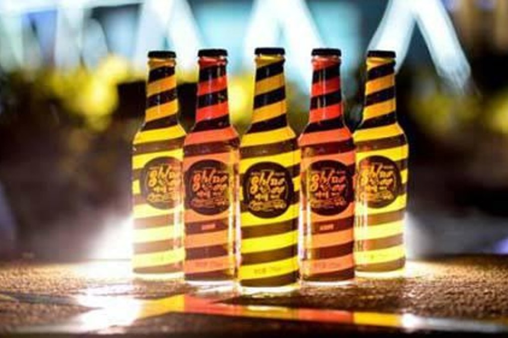 Bottles of Kawa Tide are seen on a bar in this promotional image. Seven employees of a factory that makes the drink, which was found to contain an illegal drug, were recently arrested. Photo: Handout