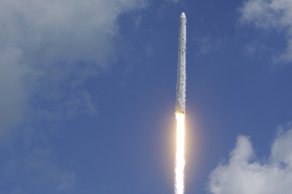 A Falcon 9 SpaceX rocket launches from pad 39A at the Kennedy Space Center in Cape Canavera. Photo: AP Photo/John Raoux