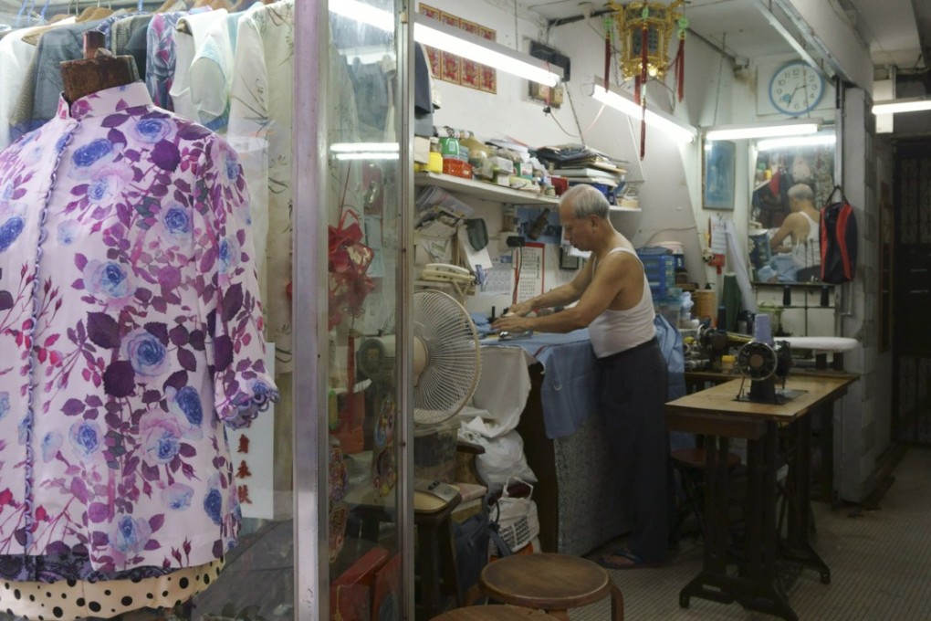 Yeung Fook, 72, has been a tailor at Man Hing on Elgin Street for around 30 years, having started as an apprentice in nearby Wellington Street at the age of 14. Photo: Olivia Chan