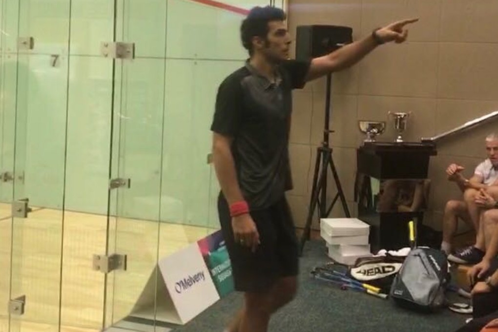 Omar Mosaad steps off court to confront the referee after an interference call. Photos: Andrew McNicol