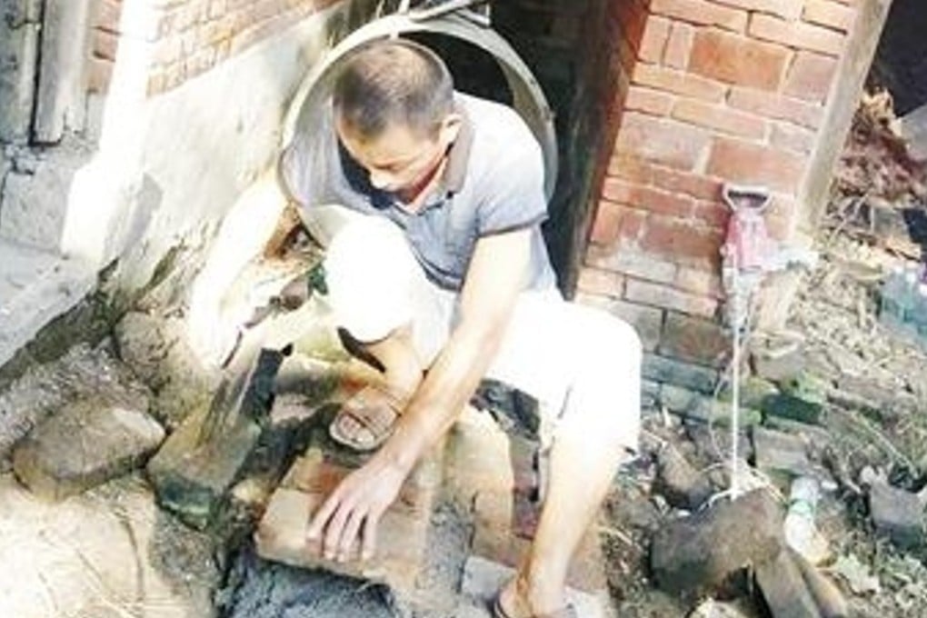 Villagers at work building their new library. Photo: Handout
