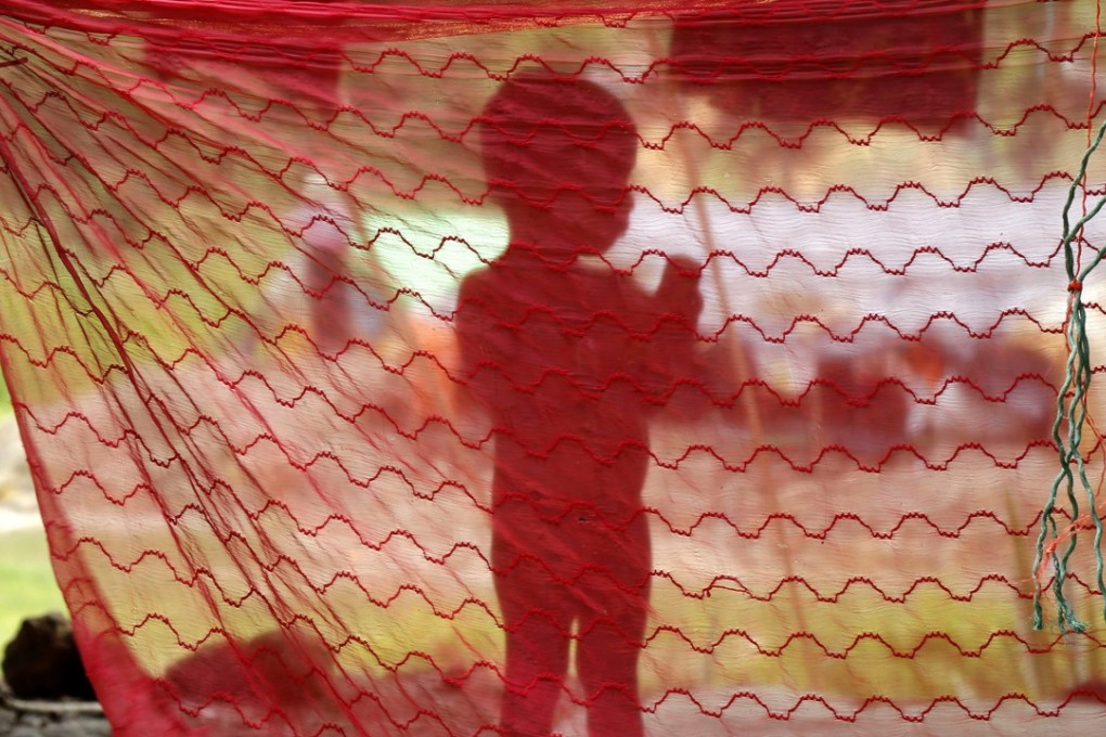 A Rohingya child stands inside a makeshift camp in Ukiya, Cox’s Bazar, Bangladesh. Many of the Rohingya fleeing the violence in Myanmar had travelled by boat to find refuge in neighbouring Bangladesh. Photo: EPA-EFE