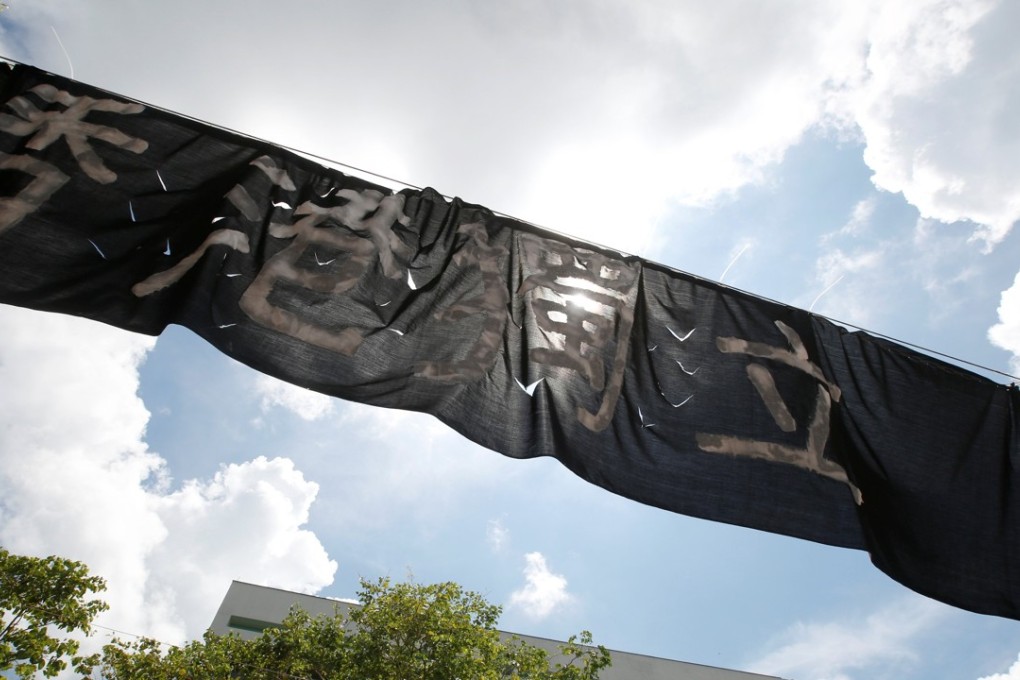 Pro-independence banners and posters have been put up at Chinese University and other institutions. Photo: Reuters