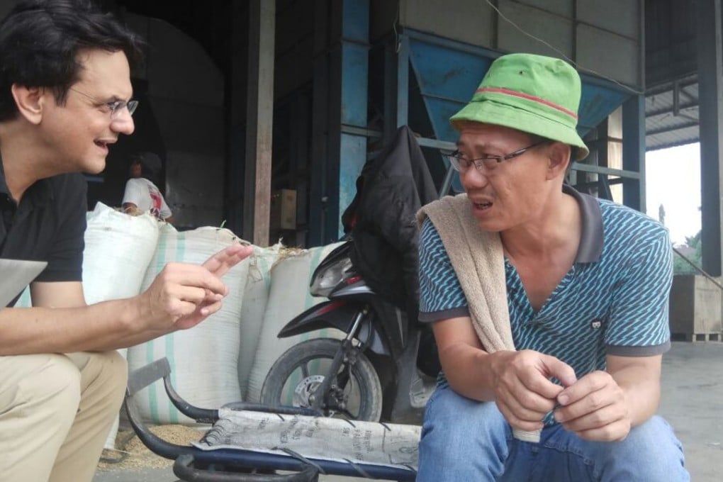 Karim Raslan speaks to Pak Darwin, a rice miller in the city of Medan, North Sumatra. Photo: Handout