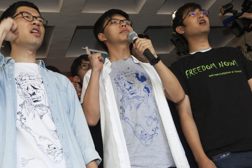 Student pro-democracy activists Nathan Law (L), Joshua Wong (C) and Alex Chow (R) speak to the media outside Hong Kong's High Court in Hong Kong, China, 17 August 2017, on the day of their sentencing. Photo: EPA