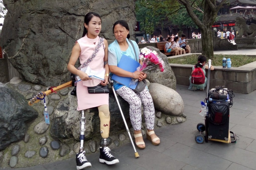 Li Yingxia and her mother Nie Liurong taking a break in a park in Dujiangyan earlier this year. Photo: Handout