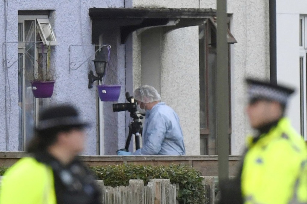 Police and forensic officers work at a property in Sunbury-on-Thames, southwest London, as part of the investigation into Friday's Parsons Green bombing. Photo: AP