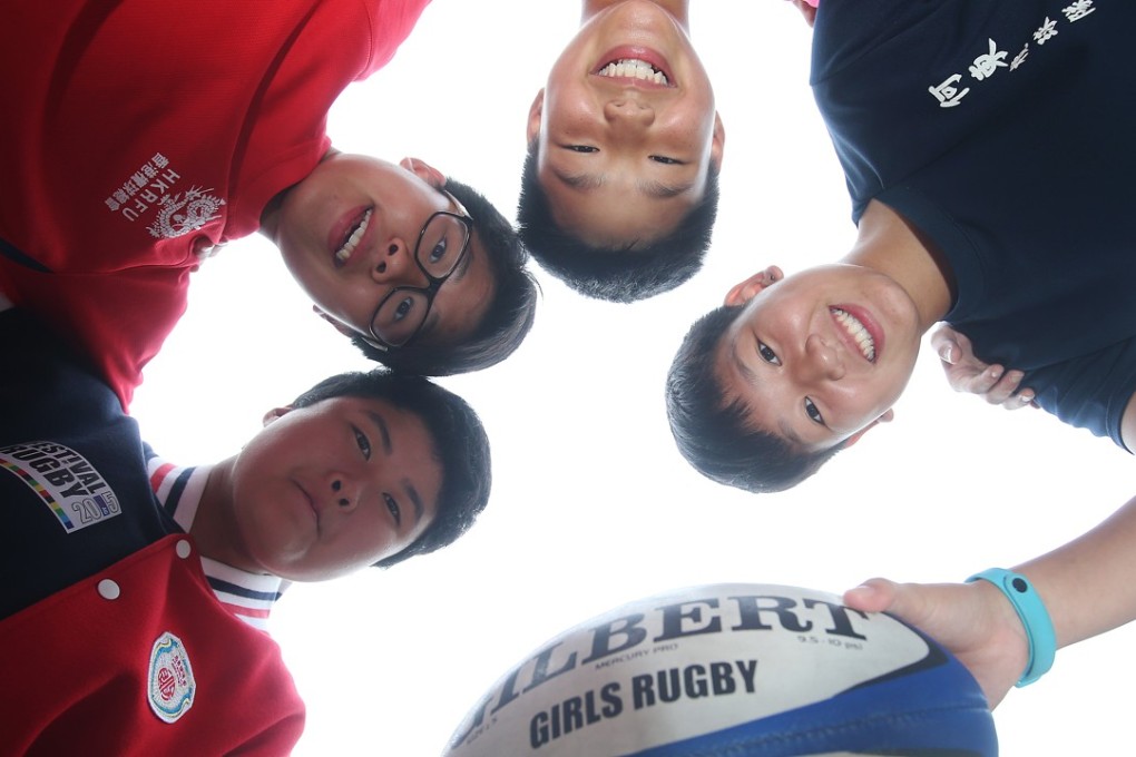 Kinki Lam (left), Cathy Wong, Candy Lo and Lisa Wong are thriving on the chance to play rugby. Photo: K. Y. Cheng