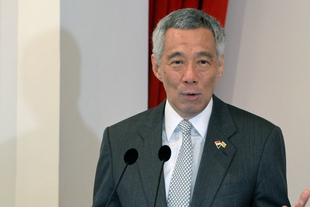 Lee Hsien Long’s three-day visit is aimed at improving relations between the countries. Photo: AFP