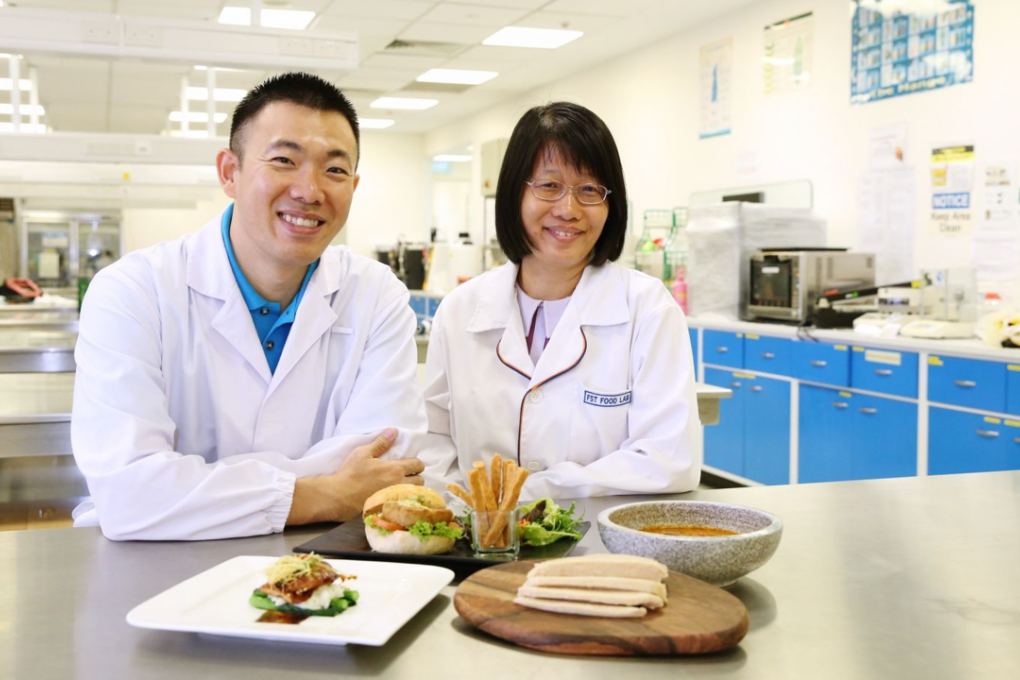 Ricky Lin (left), founder of Life3 Biotech, and Dr Leong Lai Peng, senior lecturer in the NUS Department of Chemistry's Food Science and Technology Programme. Photo: Koh Mui Fong/TODAY