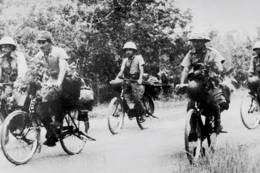 Bike-riding Japanese soldiers in Malaya, during the second world war.