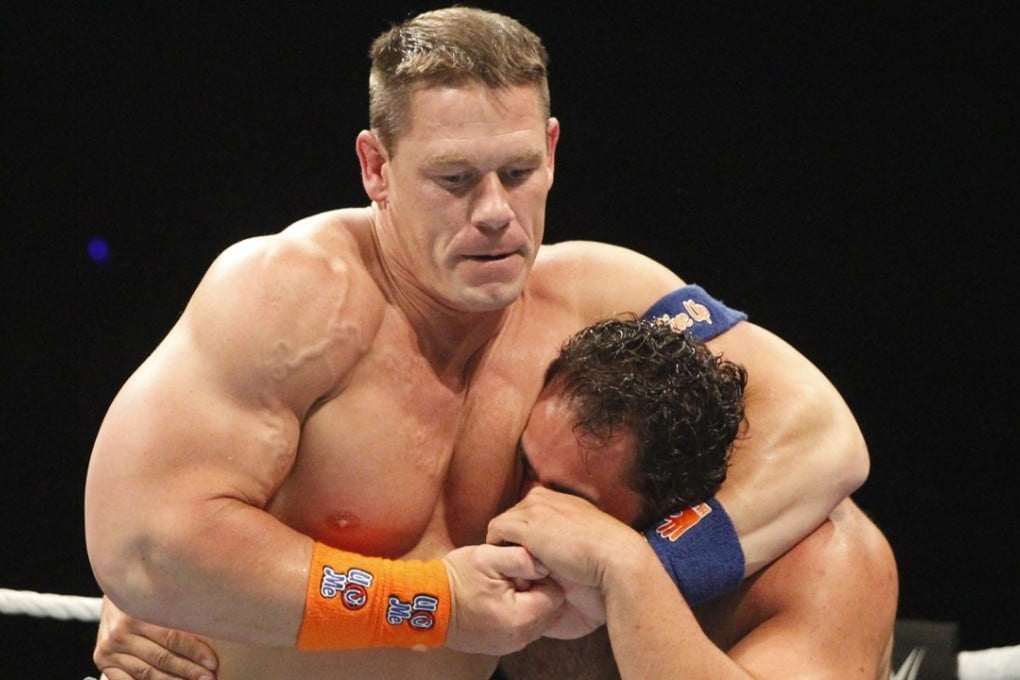 John Cenna grapples with Bulgarian nemesis Rusev at WWE Shenzhen Live on Sunday night. Photo: WWE