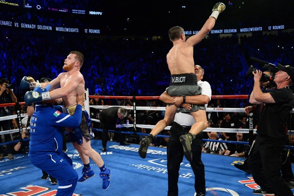 Gennady Golovkin and Canelo Alvarez both celebrate after their world middleweight title fight in Las Vegas. Photo: USA Today