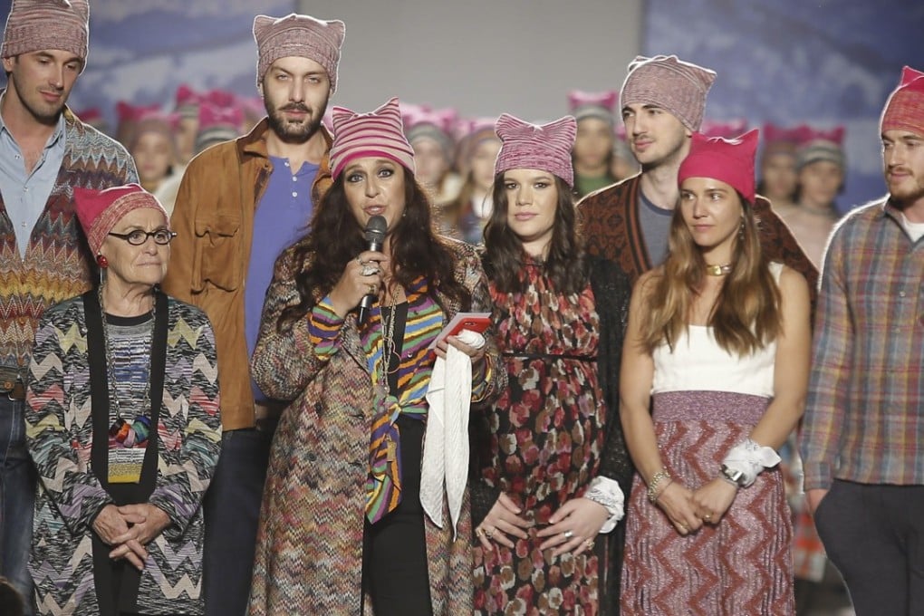 Designer Angela Missoni, flanked by her mother Rosita, left, and other family members, addresses the audience after her autumn/winter 2017/18 show.