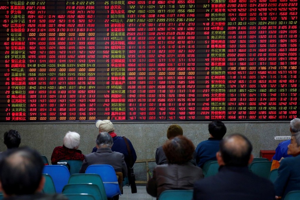 Investors at a brokerage in Shanghai. Photo: Reuters
