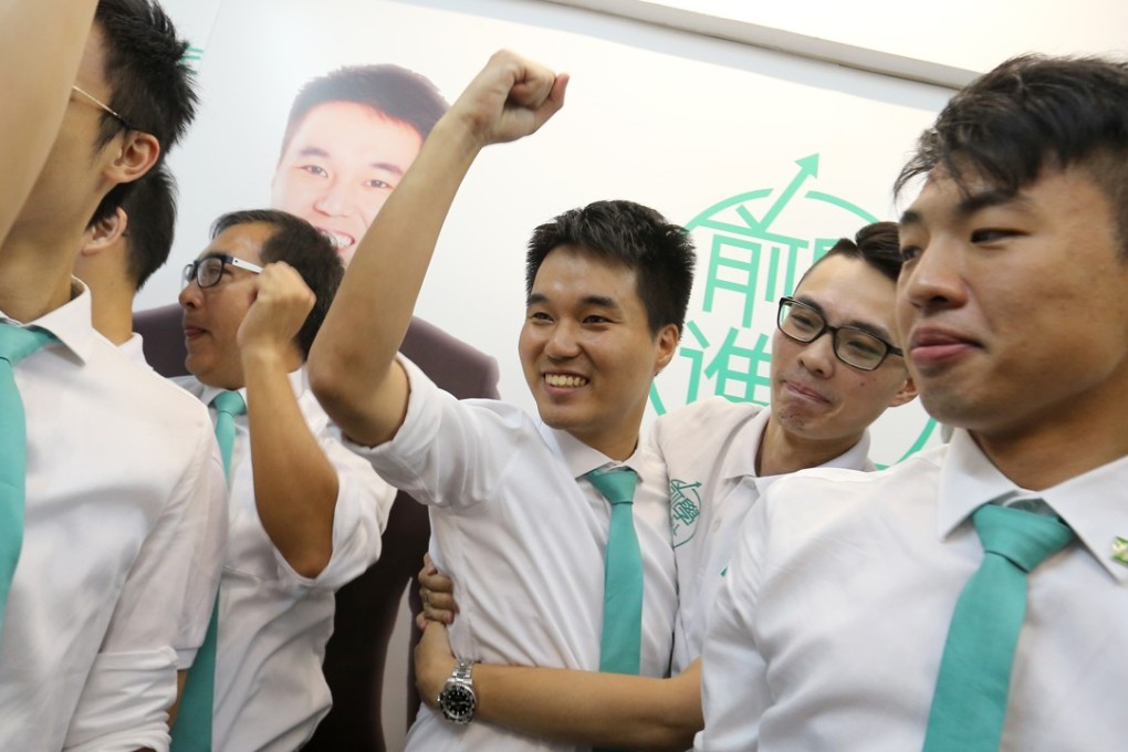 Sulu Sou (centre) celebrating his election on Monday to Macau’s Legislative Assembly. Photo: Dickson Lee