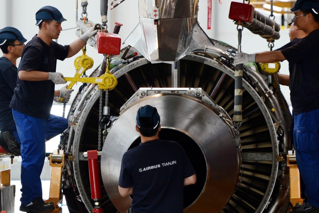 A file picture of workers at an Airbus aviation plant in Tianjin in northern China. Photo: AFP