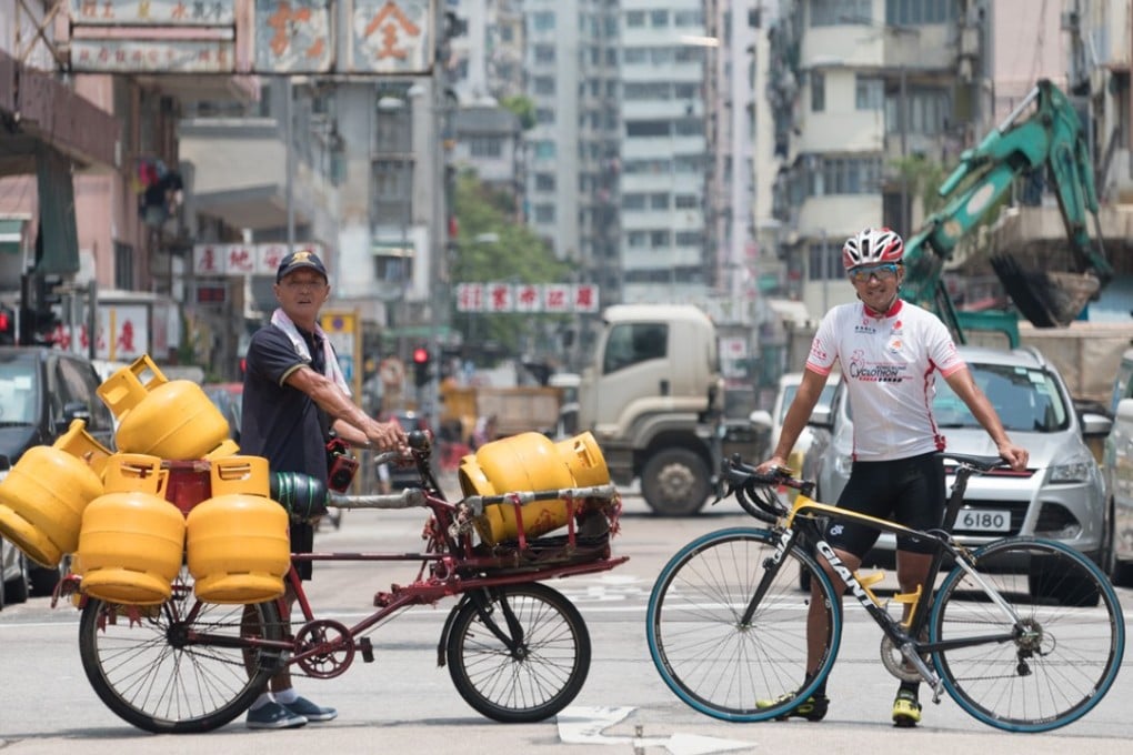 Wong Kam-po with Uncle Hung and their bikes. Photos: HKTB