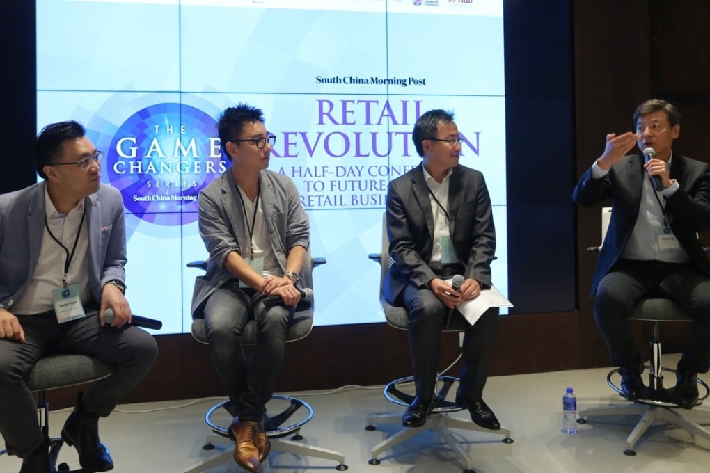 Paul Jung (far right), Visa's head of products and digital innovation for Northeast Asia, speaks at a panel discussion at the Game Changers conference. Also on the panel (from left) are Joseph Yuen, the chairman of the Hong Kong Federation of E-Commerce; Andrew Lo, the founder of Hong Kong-based payment solutions provider EFT Payments; and Joseph Chan, the chief executive at electronic payment service Asiapay. Photo: SCMP