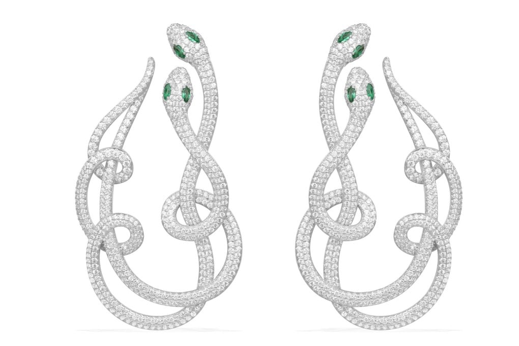 Make a statement with the serpentine earrings from APM Monaco and the embroidered dress by Needle & Thread