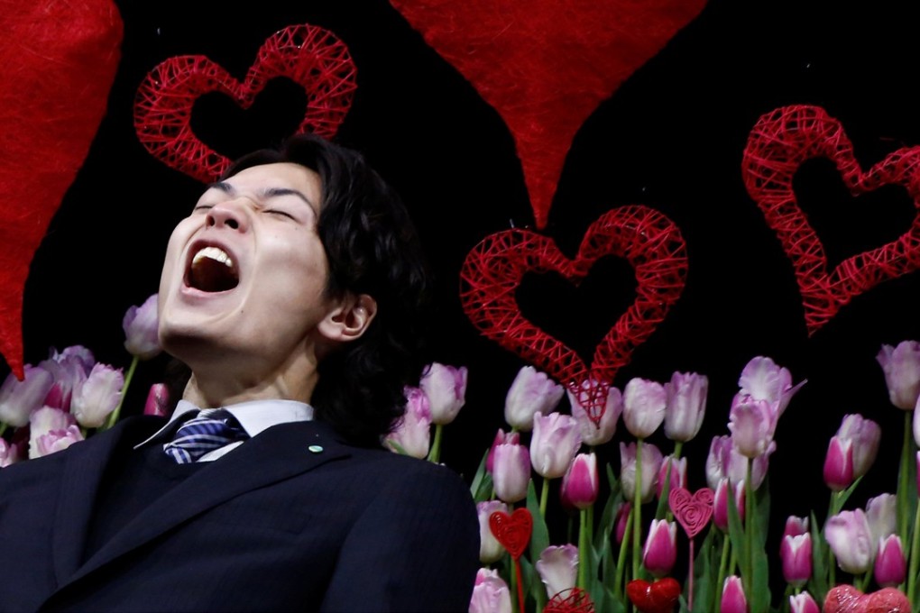 A man shouts as he expresses love for his girlfriend at an annual event in Tokyo, Japan. In the business world, there’s no need to shout about true success. Photo: Reuters