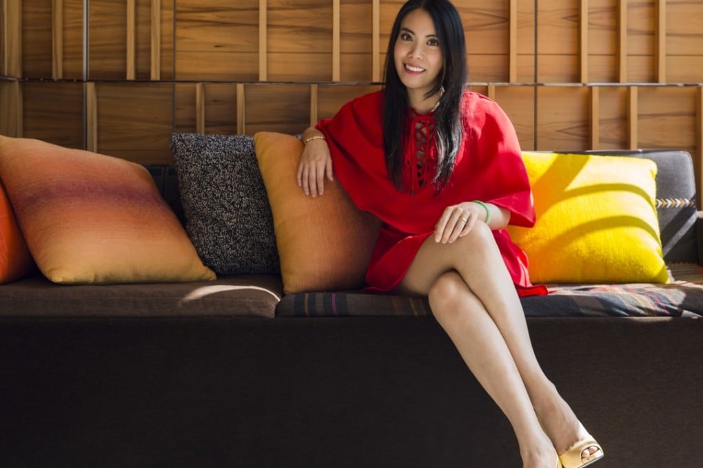 Jupyeah CFO Samathy Woo wears a red lace-up dress by Renamed, beige peep-toe pumps by Roger Vivier, a gold bracelet by Hermès, and a jade bangle. Photo: Michelle Wong