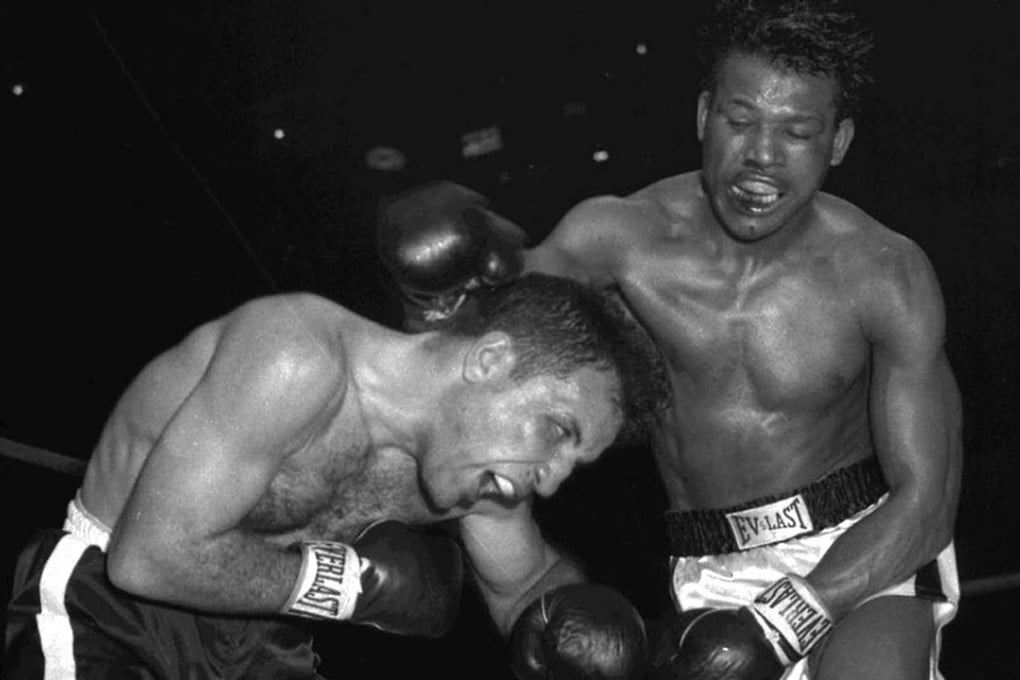 Legendary rivals Sugar Ray Robinson (R) battles Jake LaMotta for the middleweight championship at Chicago Stadium, in February 1951. Photo: AP