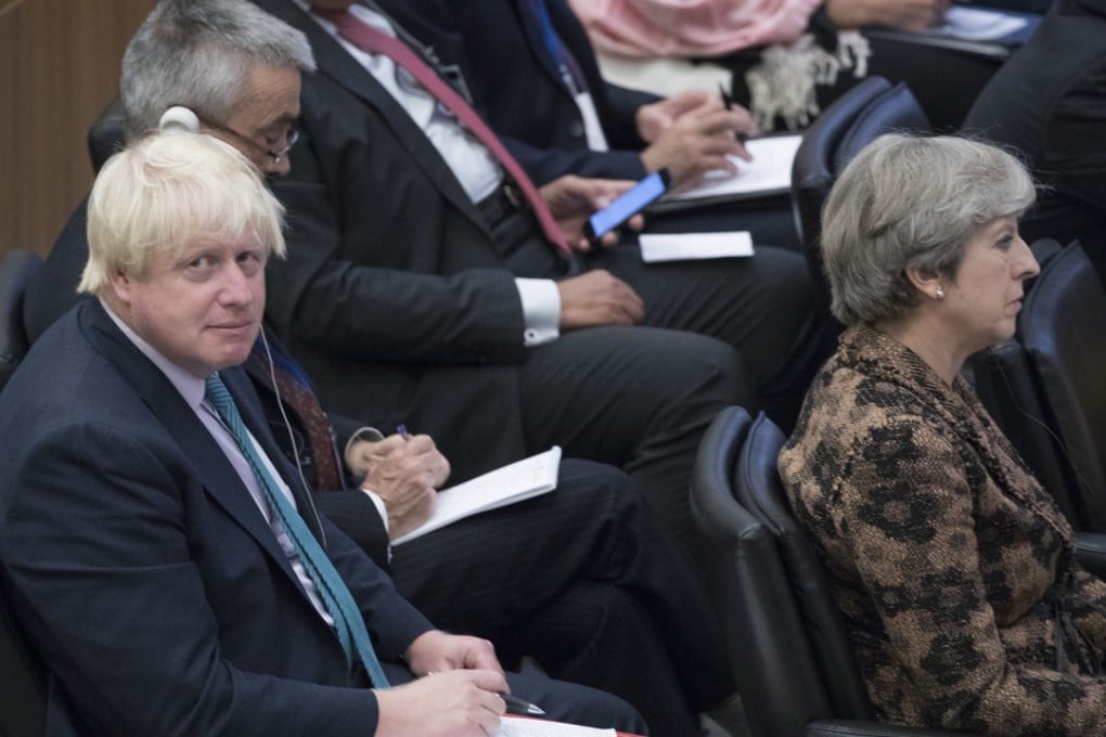 British Prime Minister Theresa May, right, and Foreign Secretary Boris Johnson attend a high-level meeting on Wednesday at United Nations headquarters in New York. Photo: AP