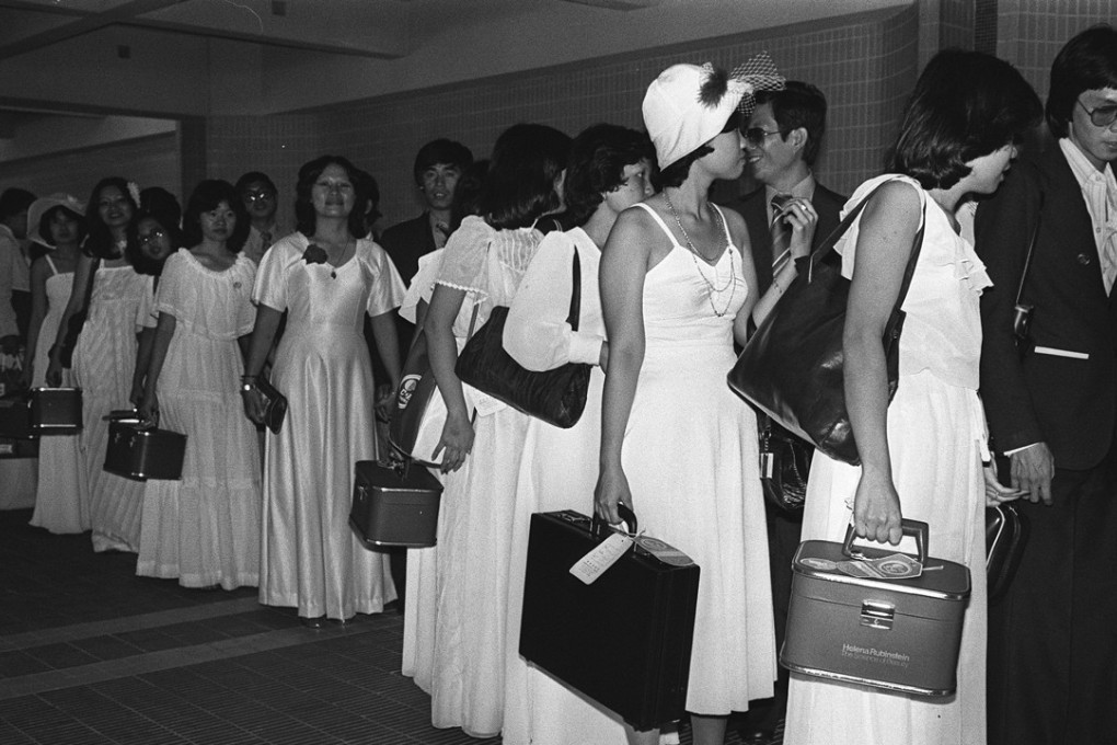 Hong Kong Tourist Association director John Pain welcomed 35 newlywed Singapore couples to Hong Kong on a honeymoon package tour. Photo: SCMP Pictures