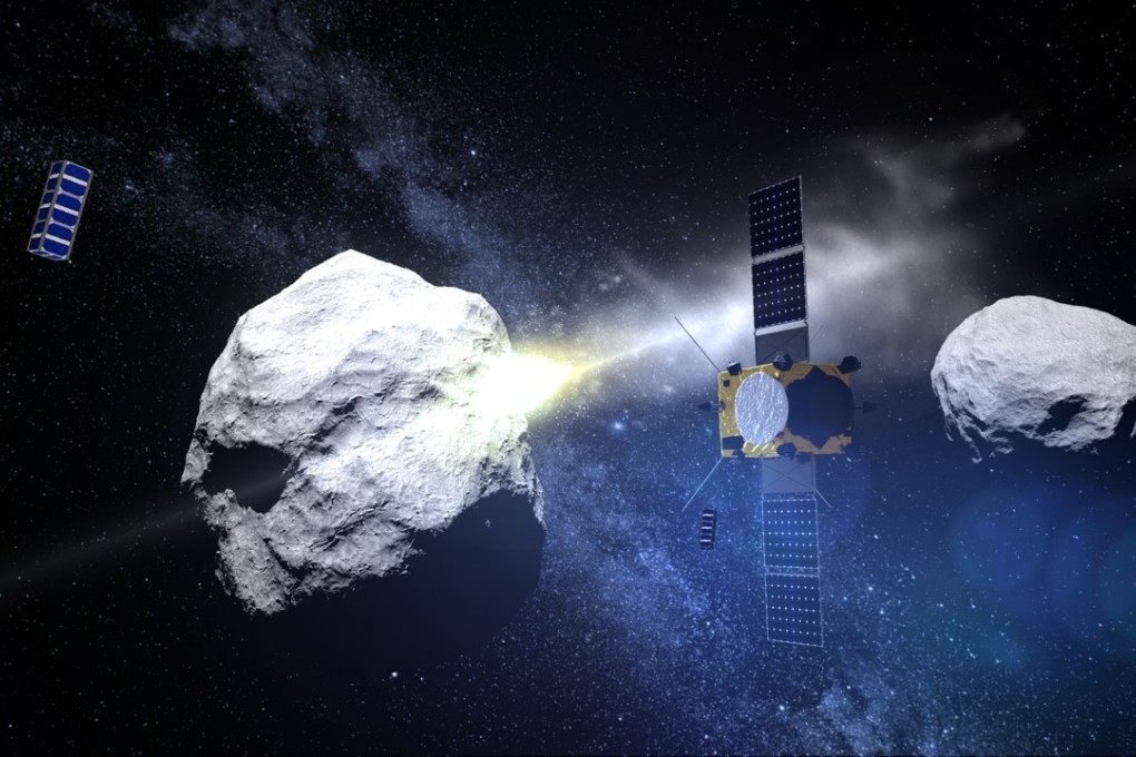 A computer generated handout image released by the European Space Agency in 2015 shows the envisaged impact of the DART (Double Asteroid Redirection Test) projectile on the binary asteroid system Didymos. Photo: EPA