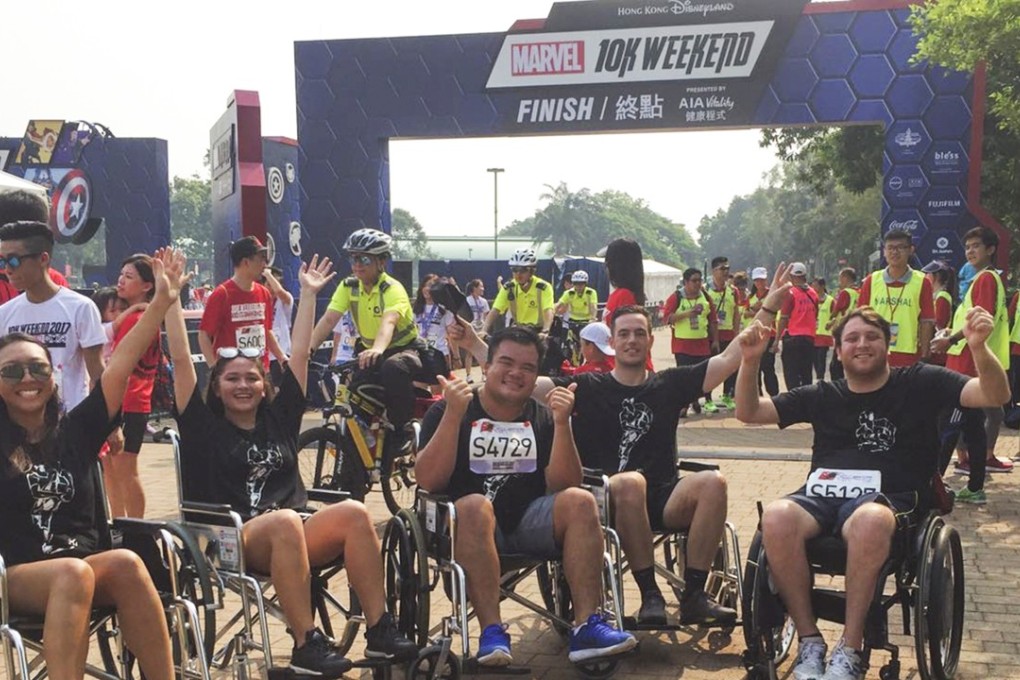 (From left) Anthea Lee, Sammy Sinclair, Jun Sing Lee, Mike Harman and Ben Kende in Disneyland. Photo: Ben Kende Foundation
