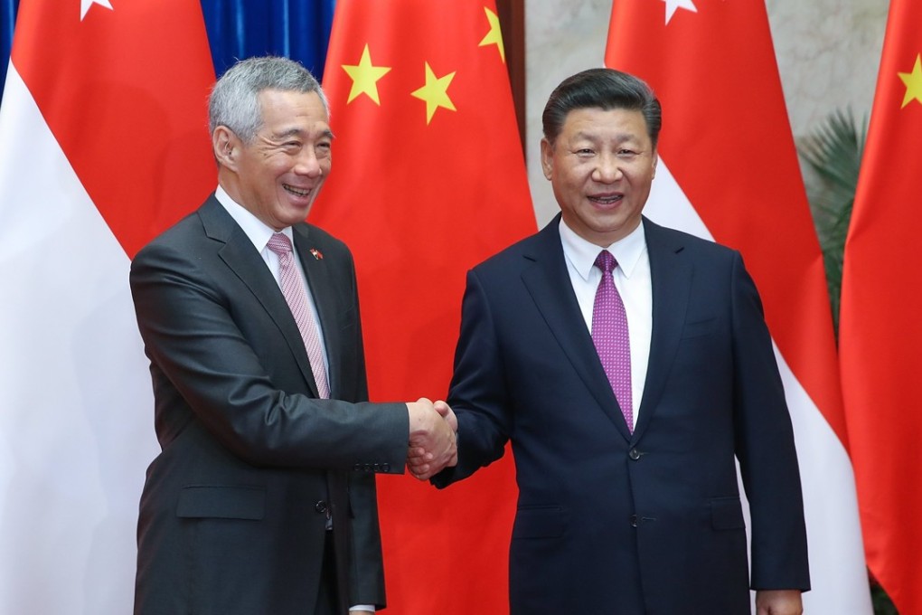 Singapore Prime Minister Lee Hsien Loong with Chinese President Xi Jinping. Photo: EPA