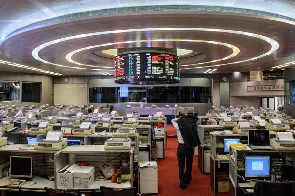The floor of the Hong Kong stock exchange. The Hang Seng Index closed the week with a 0.3 per cent advance. Photo: AFP