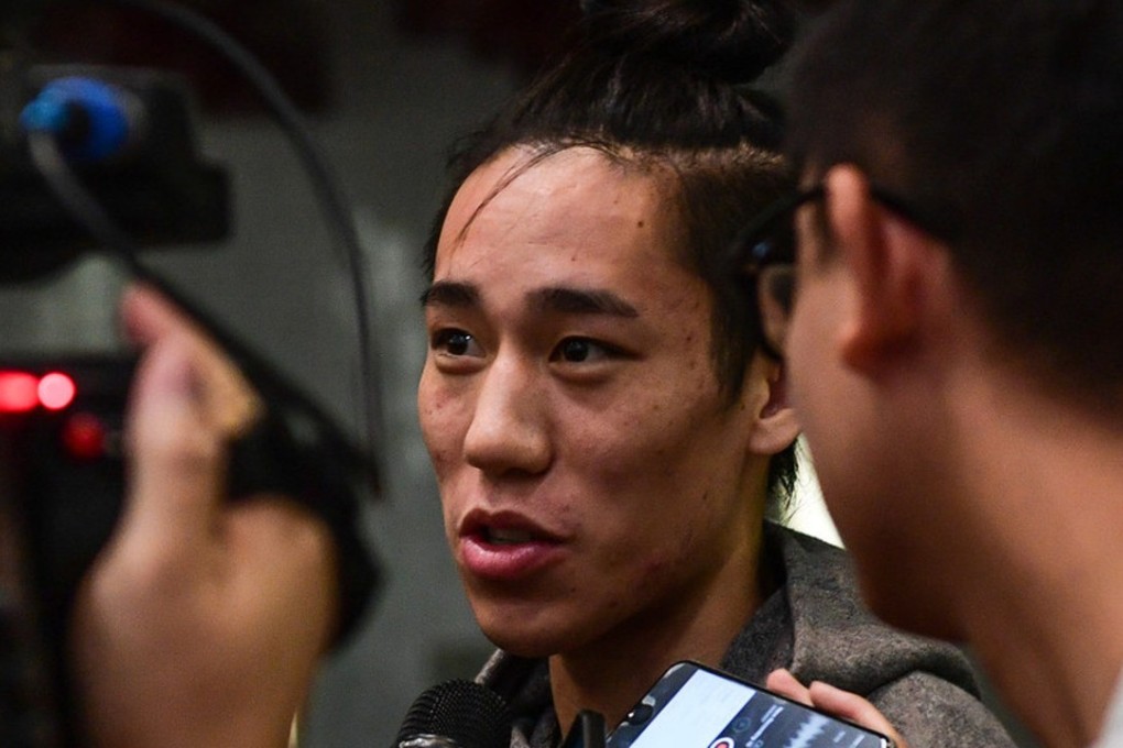 Joseph Lin is mobbed by the media at the Super 8 press conference. Photo: The Super 8