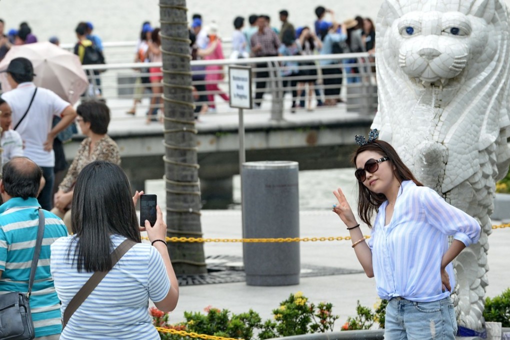 More than 1.5 million visitors arrived in Singapore from mainland China in the first half of the year, the Chinese embassy says. Photo: AFP