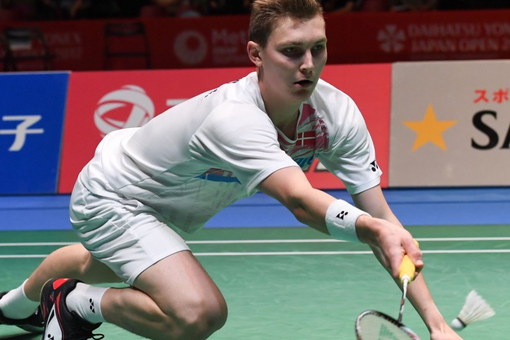 Denmark’s Viktor Axelsen of Denmark hits a return against Son Wan-Ho of South Korea during their men's singles semi-final at the Japan Open. Photos: AFP