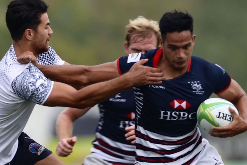 Michael Coverdale feels the heat on the opening day of round two of the Asia Rugby Sevens Series. Photo: HKRU