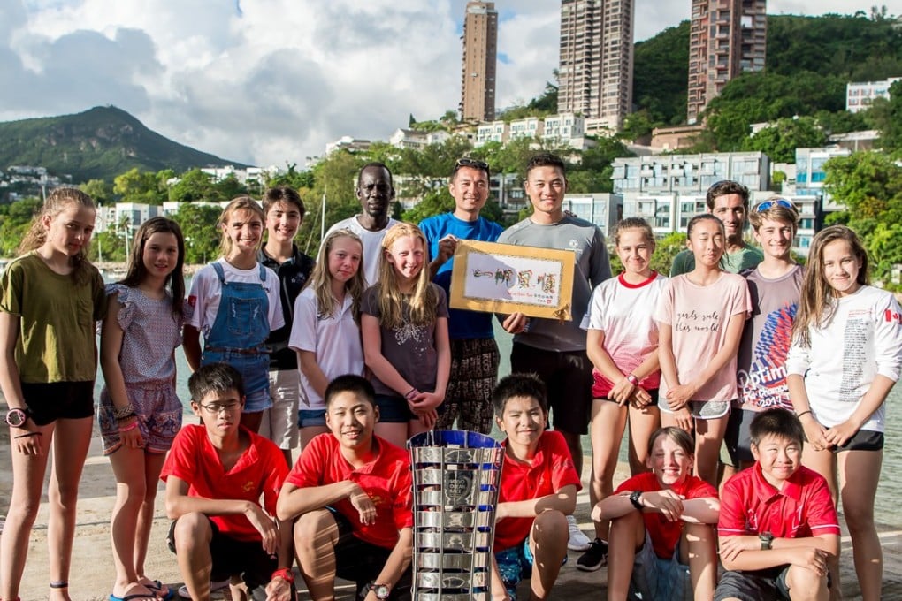 Horace Chen and Kit Cheng with a group of Hong Kong sailing enthusiasts at Middle Island. Photo: Ike Li