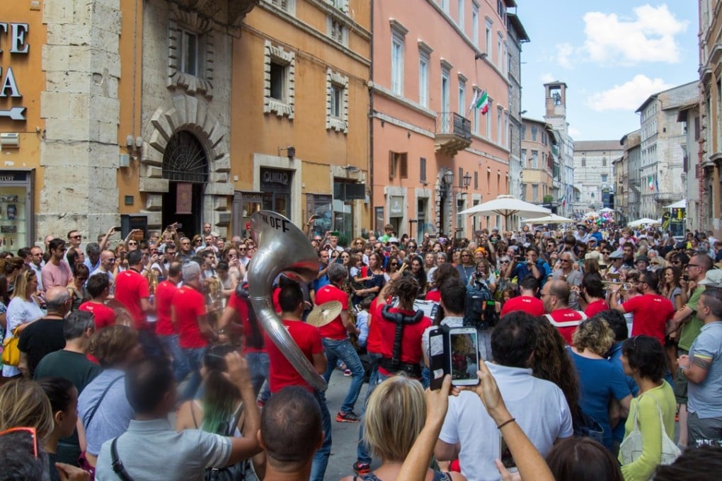 A roving brass band in the streets of Perugia in Umbria during the jazz festival. Photo: AP