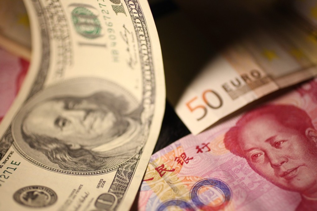 A report published by a group of Chinese economists, several of them past and current central bank officials, has said the time is now ripe to allow a freer exchange rate mechanism for the yuan. Photo: EPA