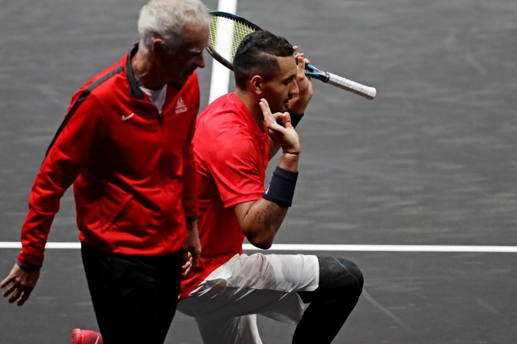 Nick Kyrgios said he took a knee ahead of his Laver Cup match against Roger Federer in tribute to his dead grandparents. Photo: Reuters