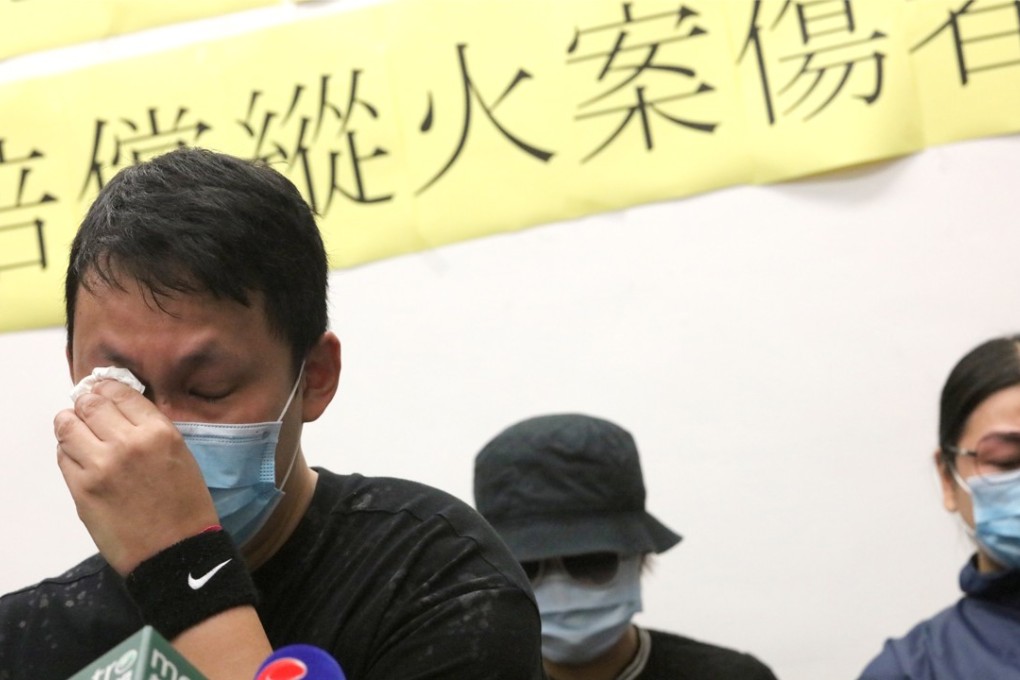 (Left) Martin Cheng said he should be compensated for the injuries he received during a petrol attack on an MTR train in February. Photo: Felix Wong